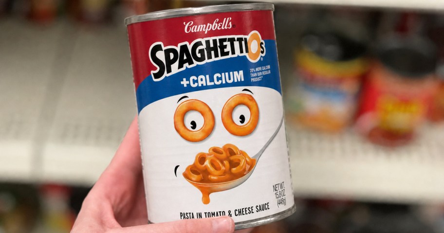 hand holding a can of SpaghettiOs&nbsp;Plus Calcium in store