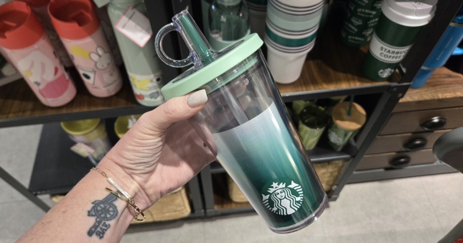 person holding Starbucks Road Trip 16oz Tumbler w/ Straw Lid in store