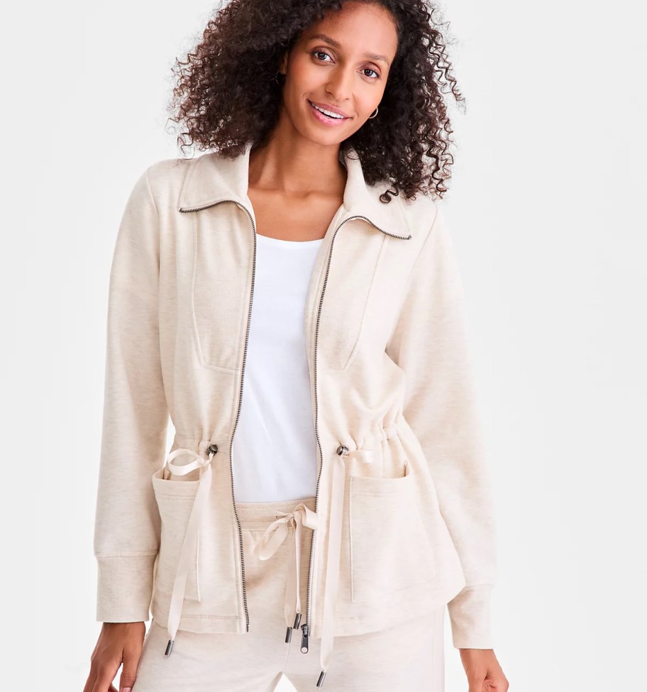 woman modeling cream jacket