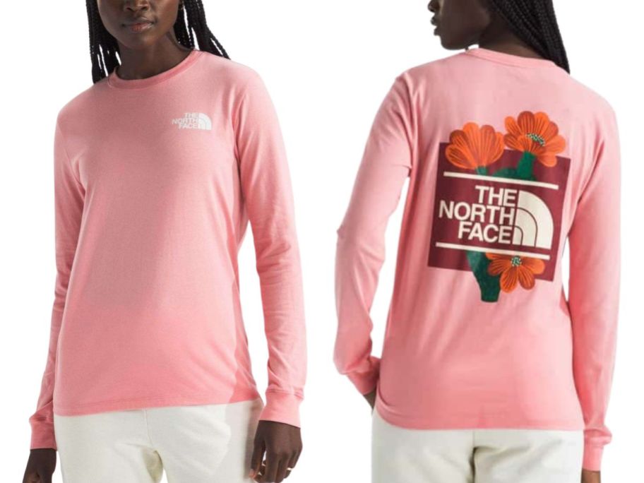 A woman wearing a pink long-sleeved t-shirt with a flower on it