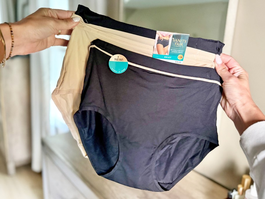 hands holding up 3 pairs of Vanity Fair Panties