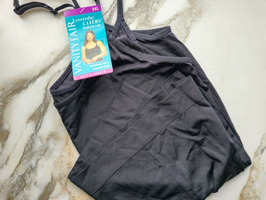 Vanity fair cami displayed on top of a marble table