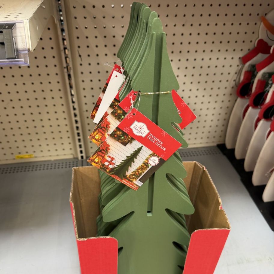 Wooden slatted CHristmas trees at the store