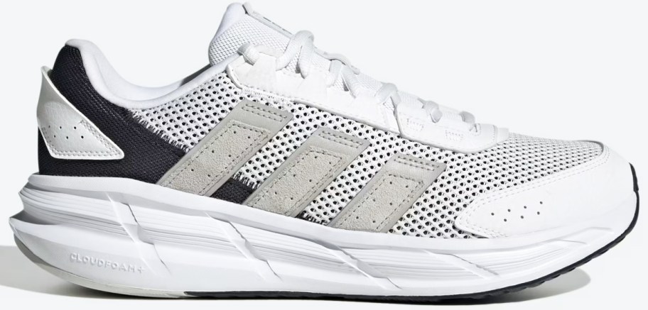 white, grey, and black mesh running shoe