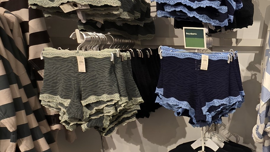 two pair of aerie underwear hanging on a display wall in a store