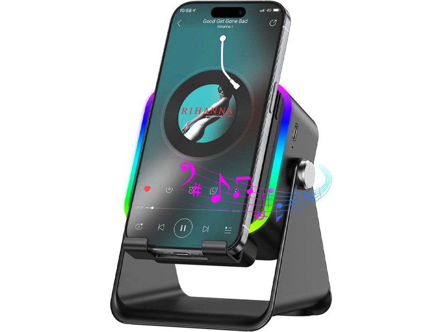 black speaker with phone on it 