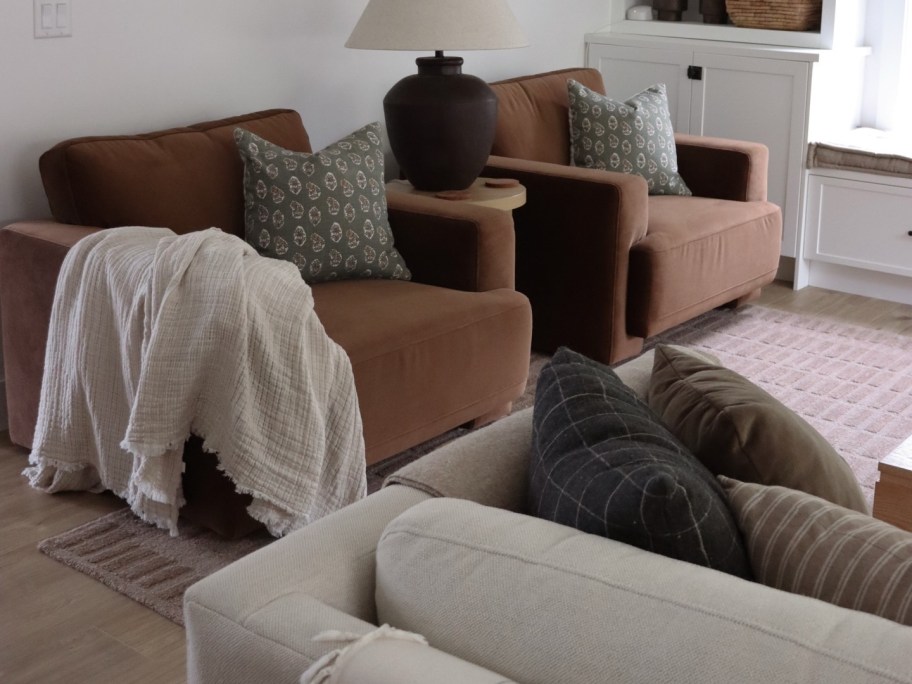 two brown chairs in a living room