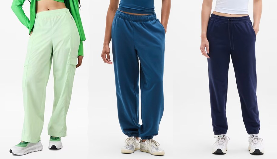 three women wearing green and blue pants