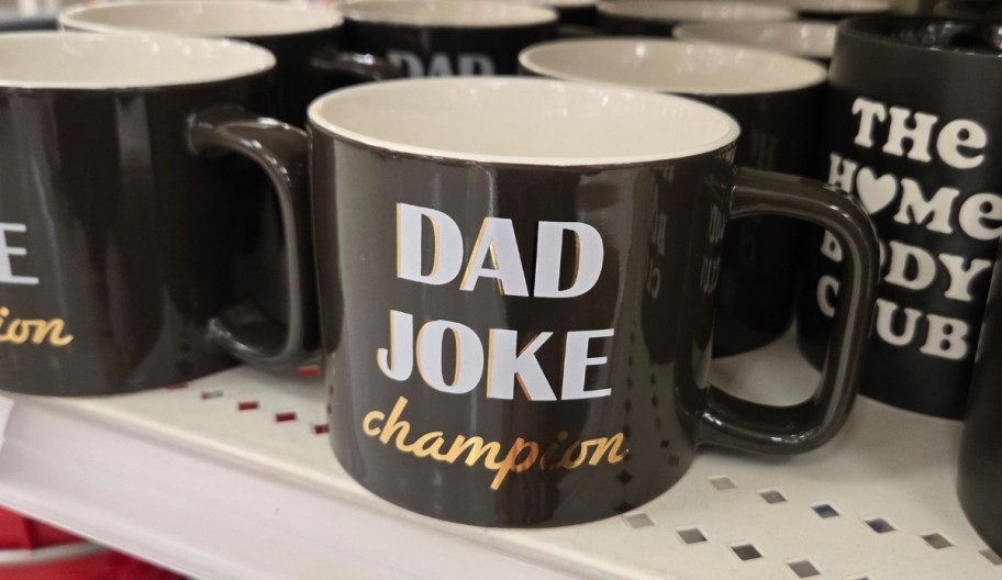 a black coffee mug on a store shelf
