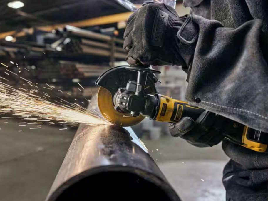 yellow and black angle grinder
