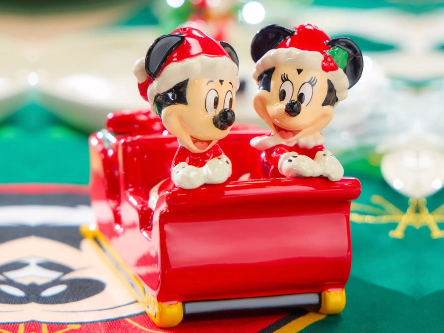 mickey and minnie mouse salt and pepper shakers in sled