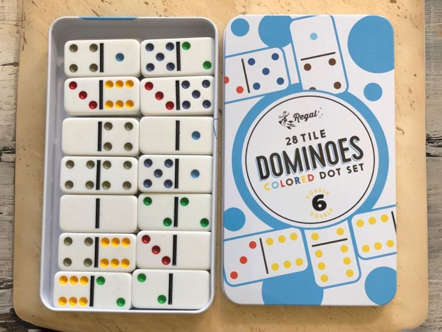 dominoes box with dominoes in it