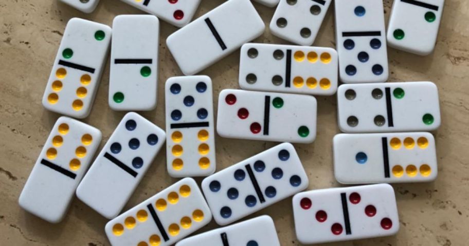 dominoes spread out on table
