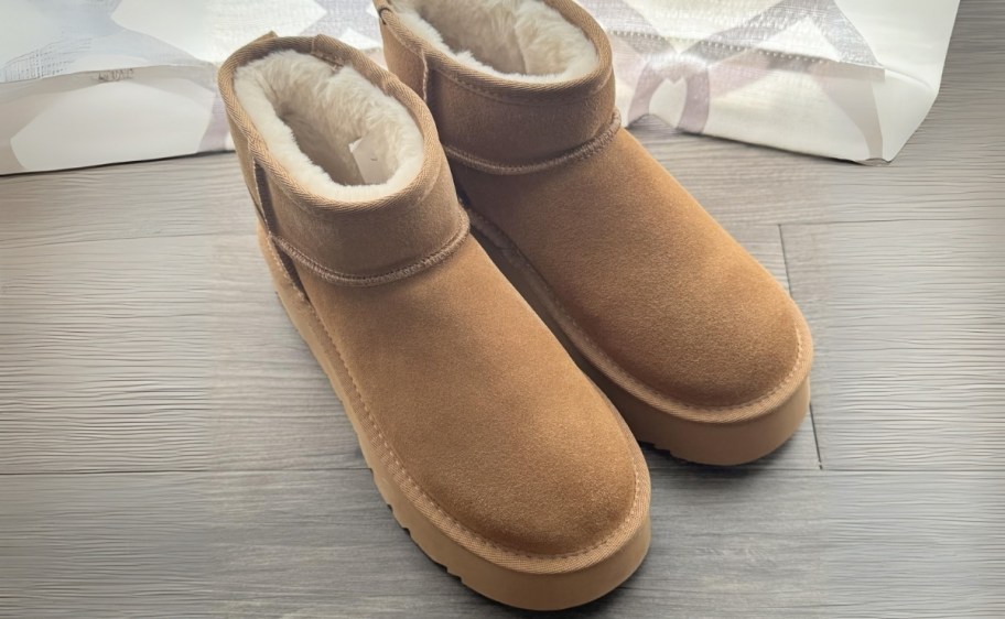 a pair of suede platform booties