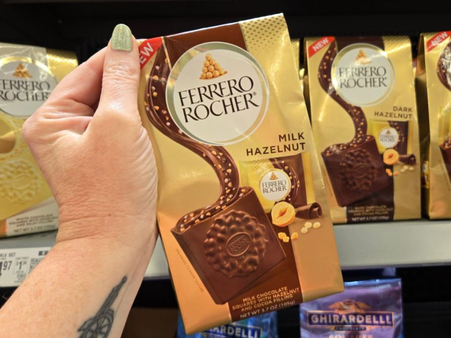 Ferrero Rocher Premium Milk Hazelnut Chocolate Square package in hand in store