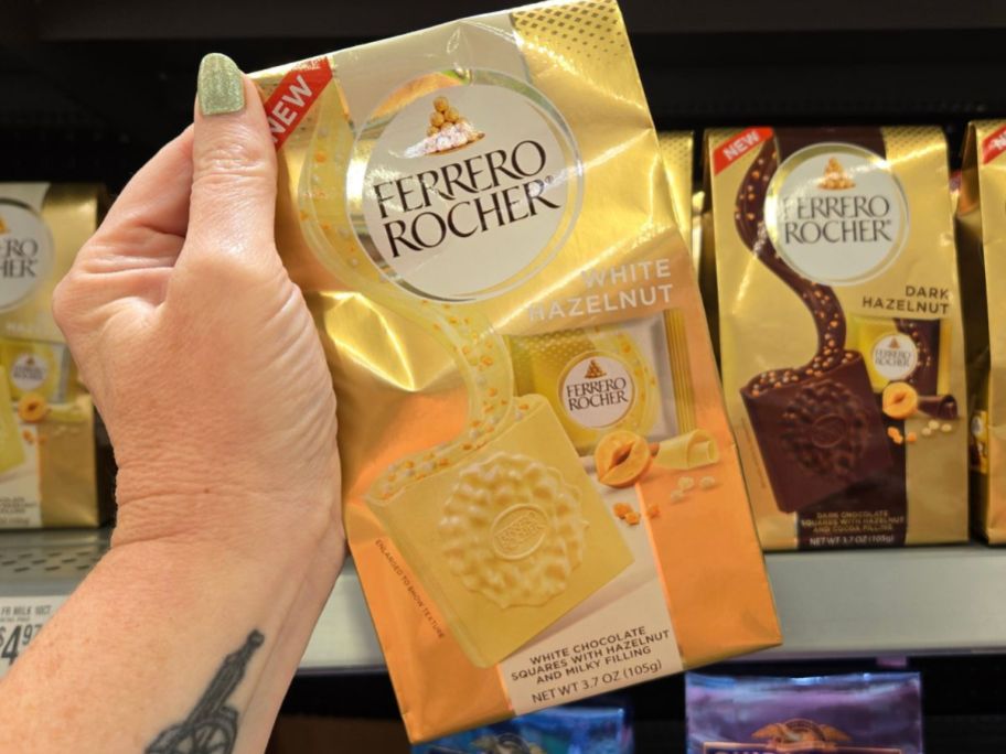 Ferrero Rocher Premium White Hazelnut Chocolate Square package in hand in store