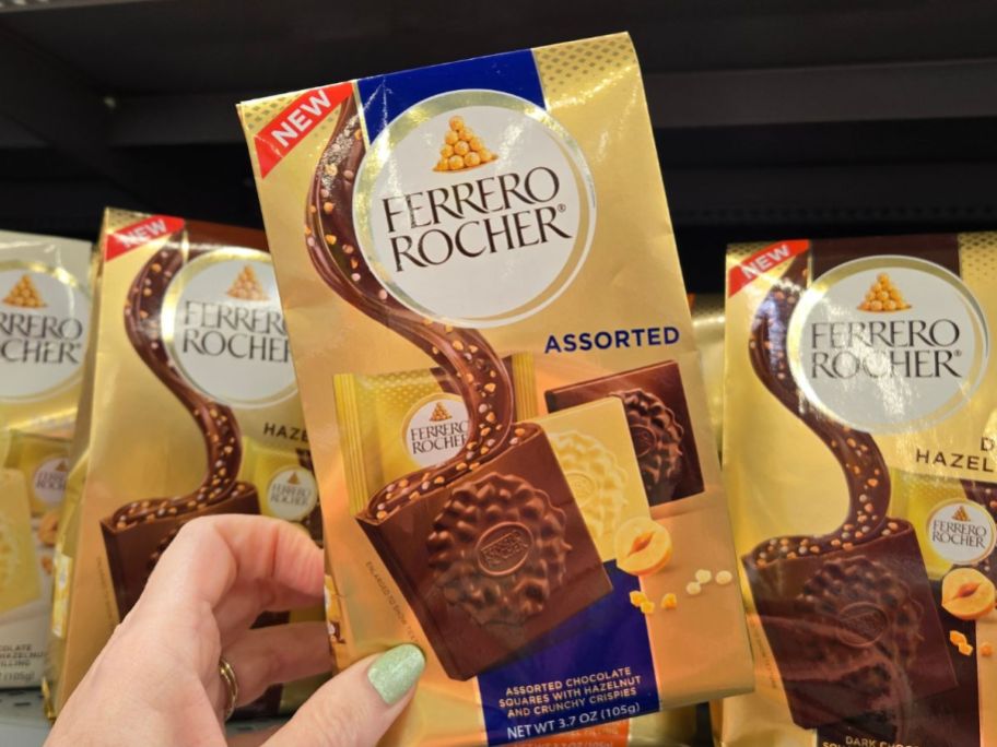 Ferrero Rocher Premium Assorted Chocolate Square package in hand in store