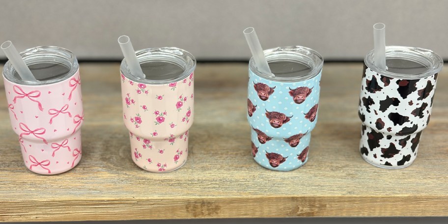 4 mini tumblers on shelf 