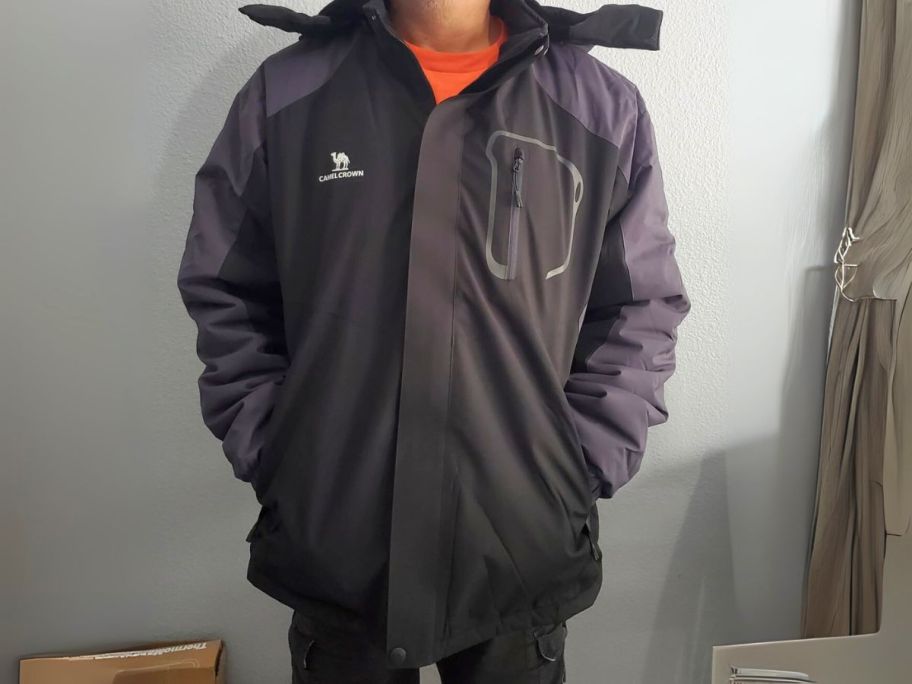 man wearing black jacket