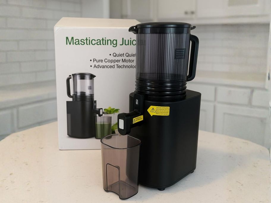 juicer with box on counter