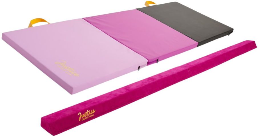 a pink and black gymnastics mat and a pink balance beam