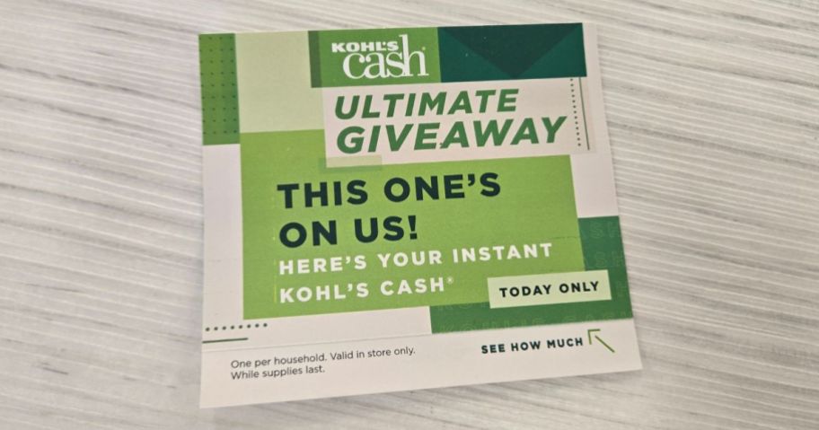 kohls cash giveaway coupon on table in store