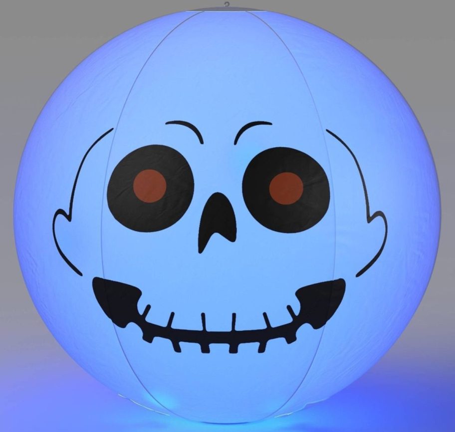 large light up skeleton wit blue lighting in the background