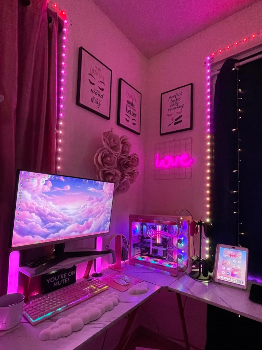pink led lights around curtains in gaming room