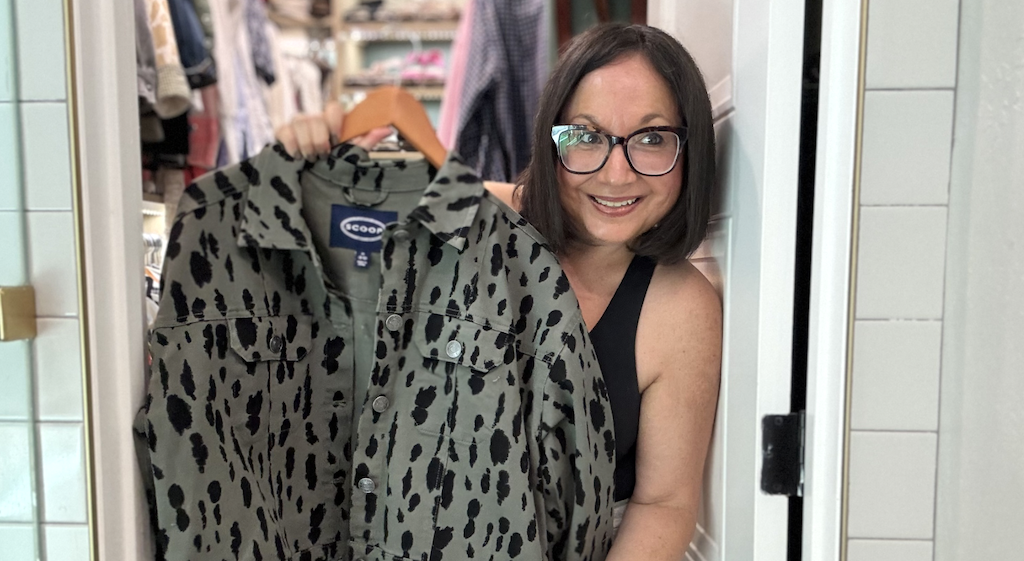 Lina holding Scoop jacket 