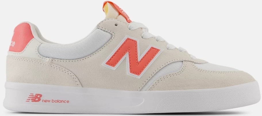 mens sneaker in white with orange accents
