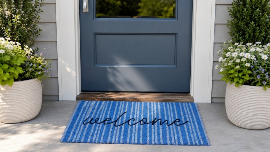 Welcome door mat at the front door