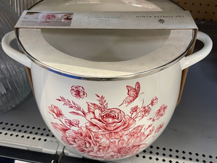 The Pioneer Woman Agatha 12-Quart Enamel on Steel Stock Pot on shelf in store