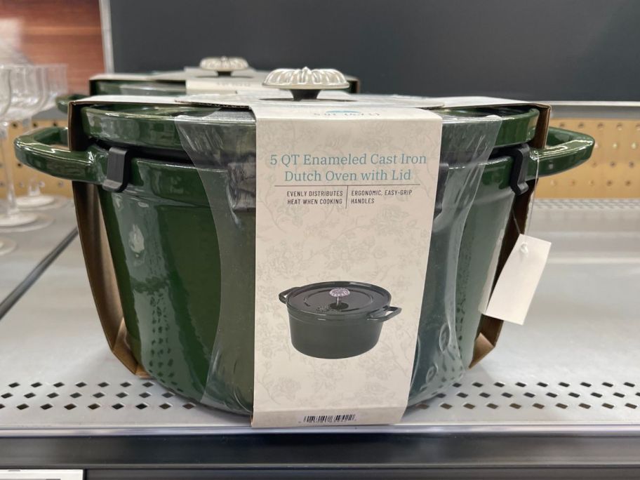 green The Pioneer Woman 5-Quart Enamel Cast Iron Dutch Oven on shelf in store