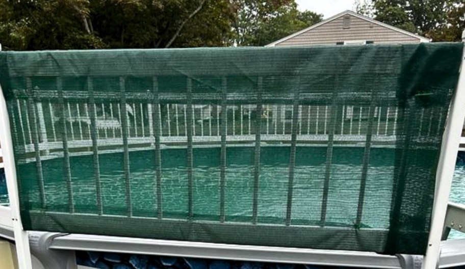 pool deck railing shown with privacy screening