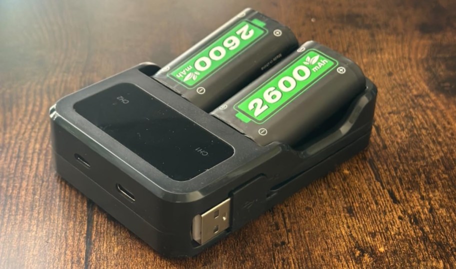 Rechargeable battery pack sitting on wood table