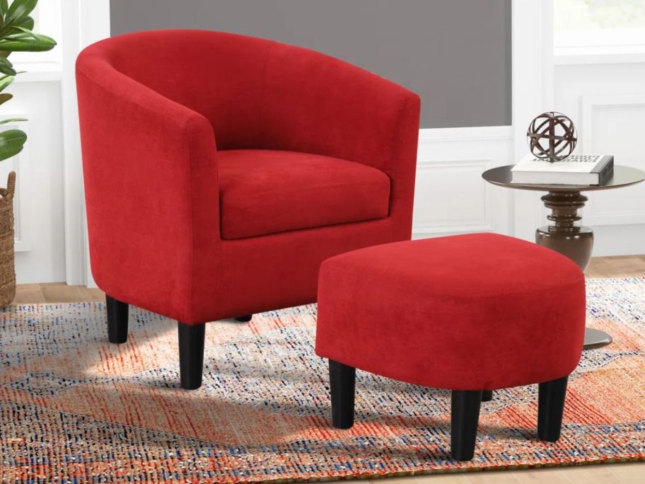 red chair with ottoman on a carpet