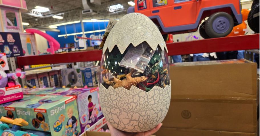 hand holding Dino Egg Playset in store