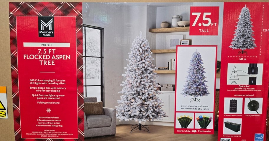 a pre-lit flocked Christmas tree in a box