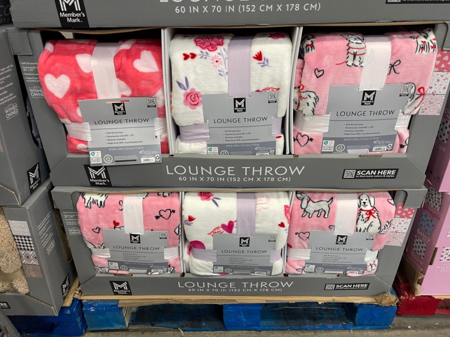Multiple Valentines throw blankets at Sams Club.
