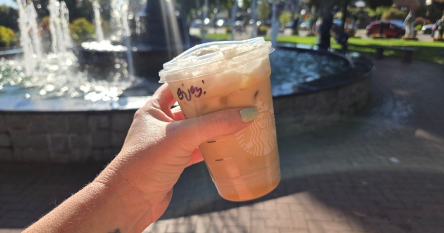 starbucks protein latte in hand