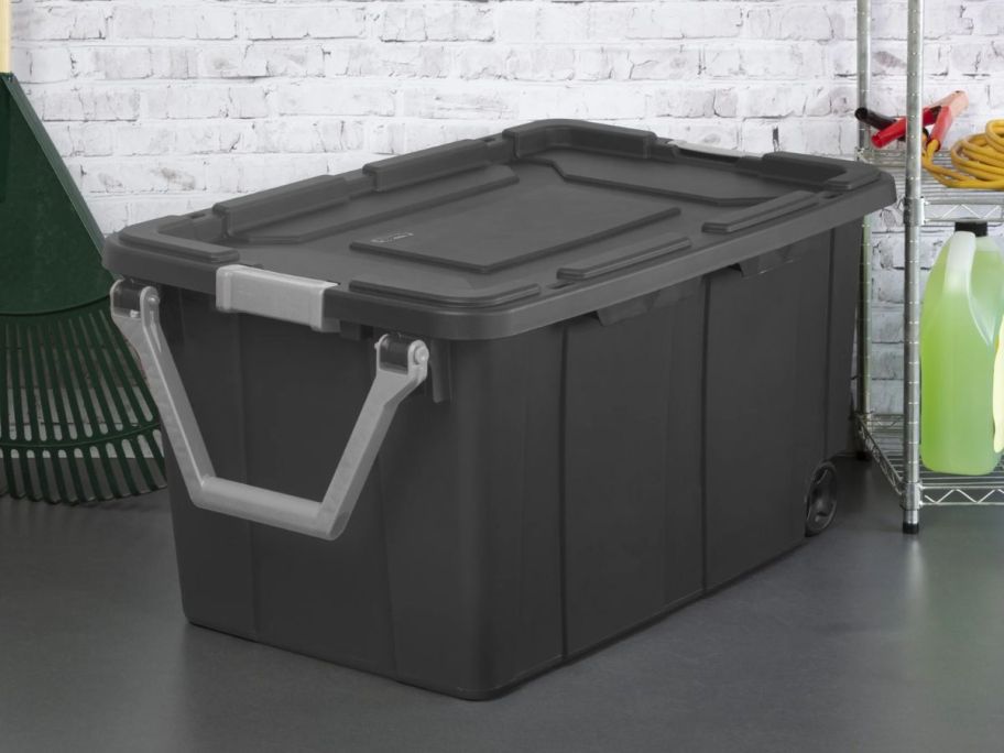 gray Sterilite 40-Gallon Wheeled Industrial Tote on floor