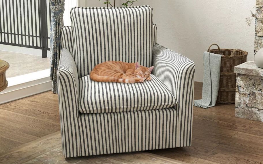 stripped accent chair with cat on it
