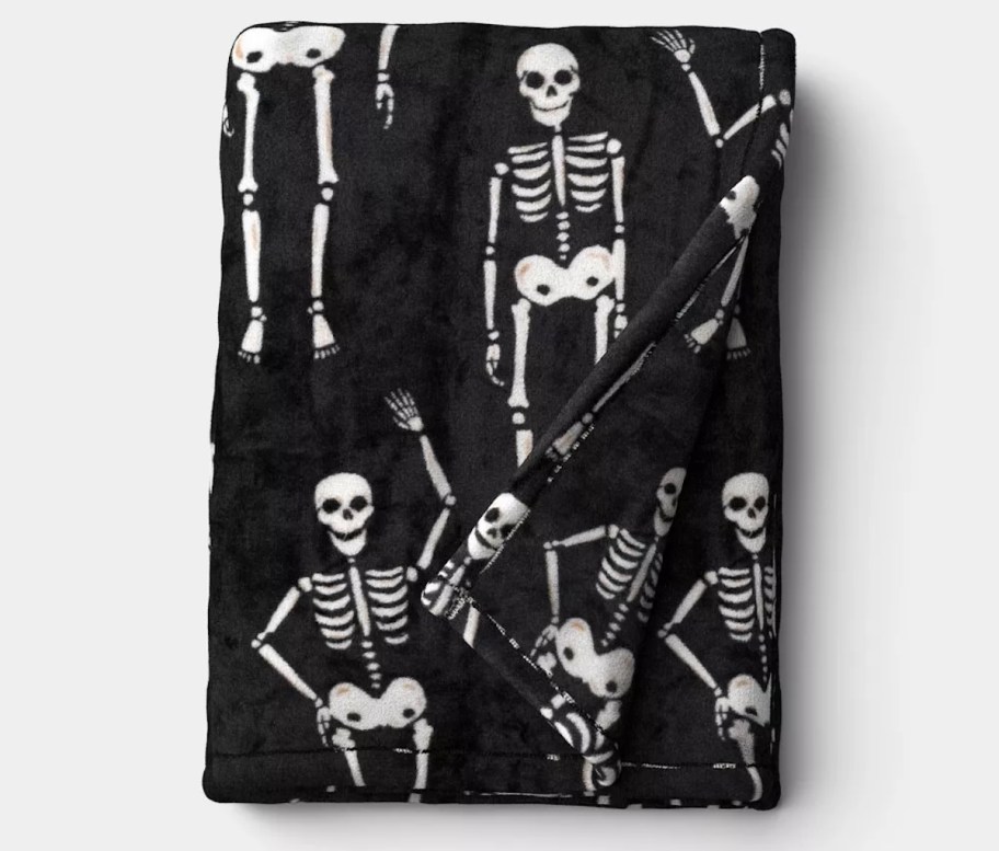 stock photo of black and white skeleton throw blanket