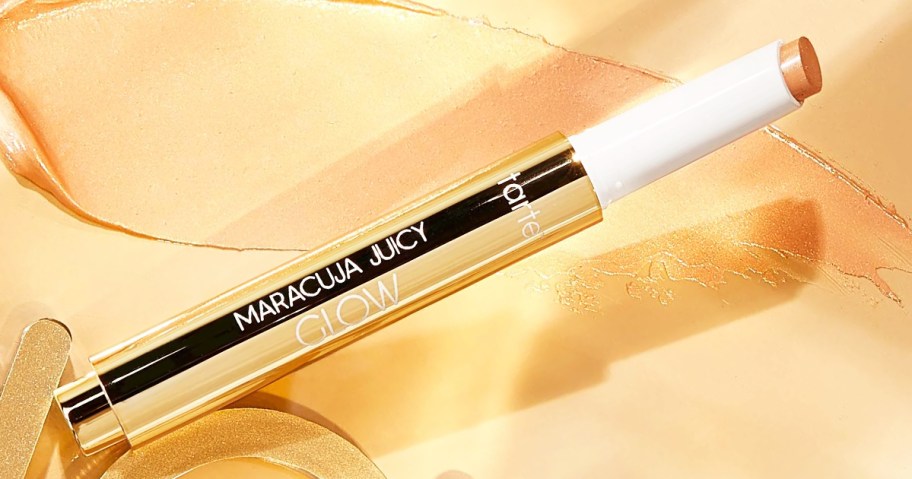 opened gold tarte Maracuja Juicy Glow Highlight stick