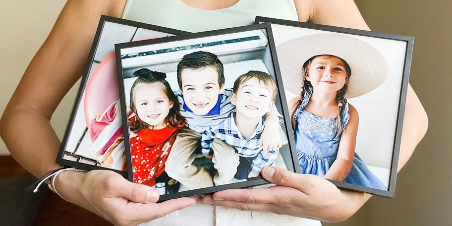 person holding three tilepix photos
