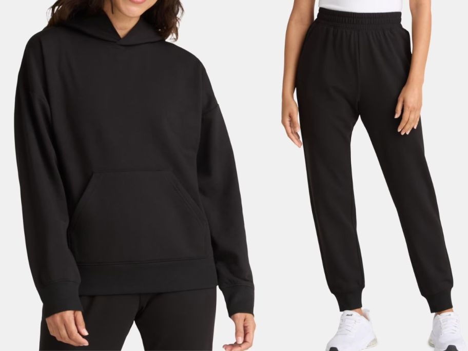 two women wearing black hoodie and sweatpants