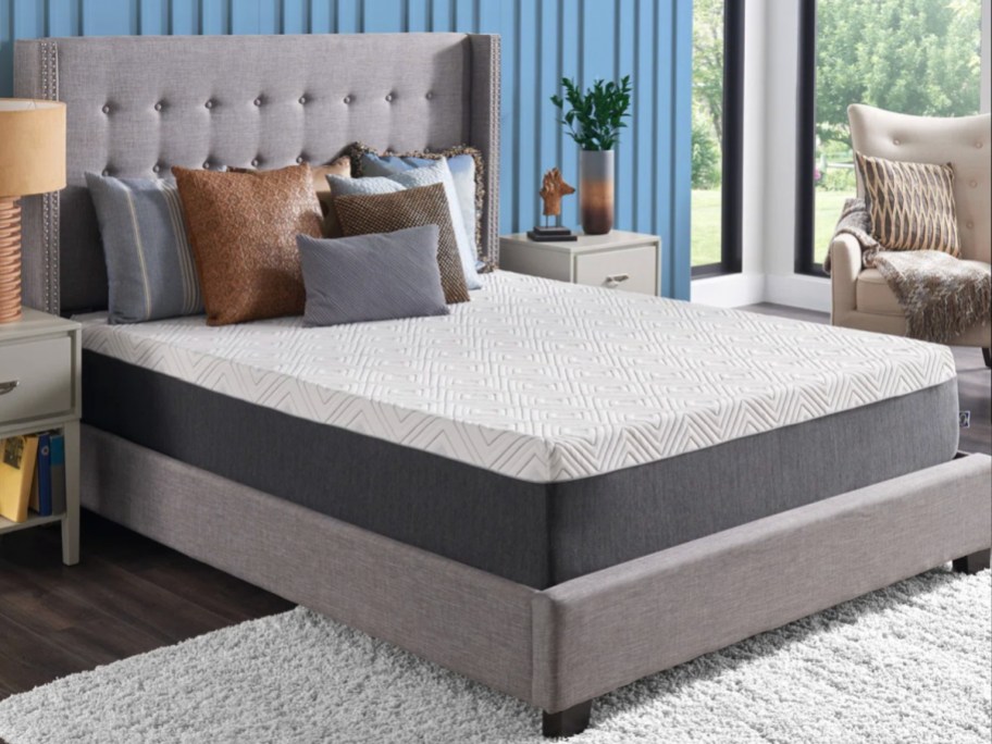 white sealy mattress on grey bed frame