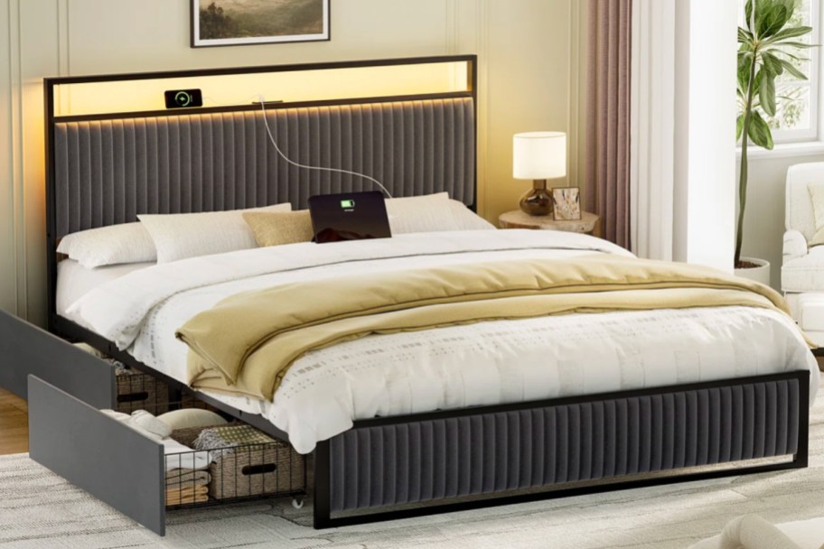 black bed frame with 2 storage drawers