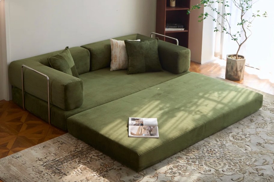 green fold out sofa bed
