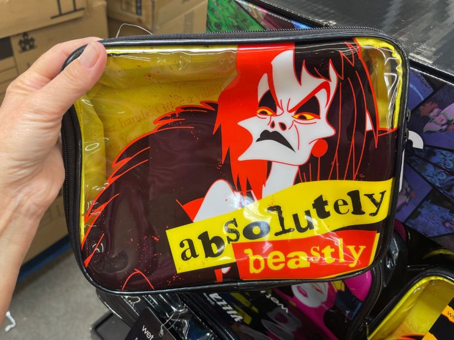 Wet N Wild Disney Villains Cruella De Vill Makeup Bag in hand in store